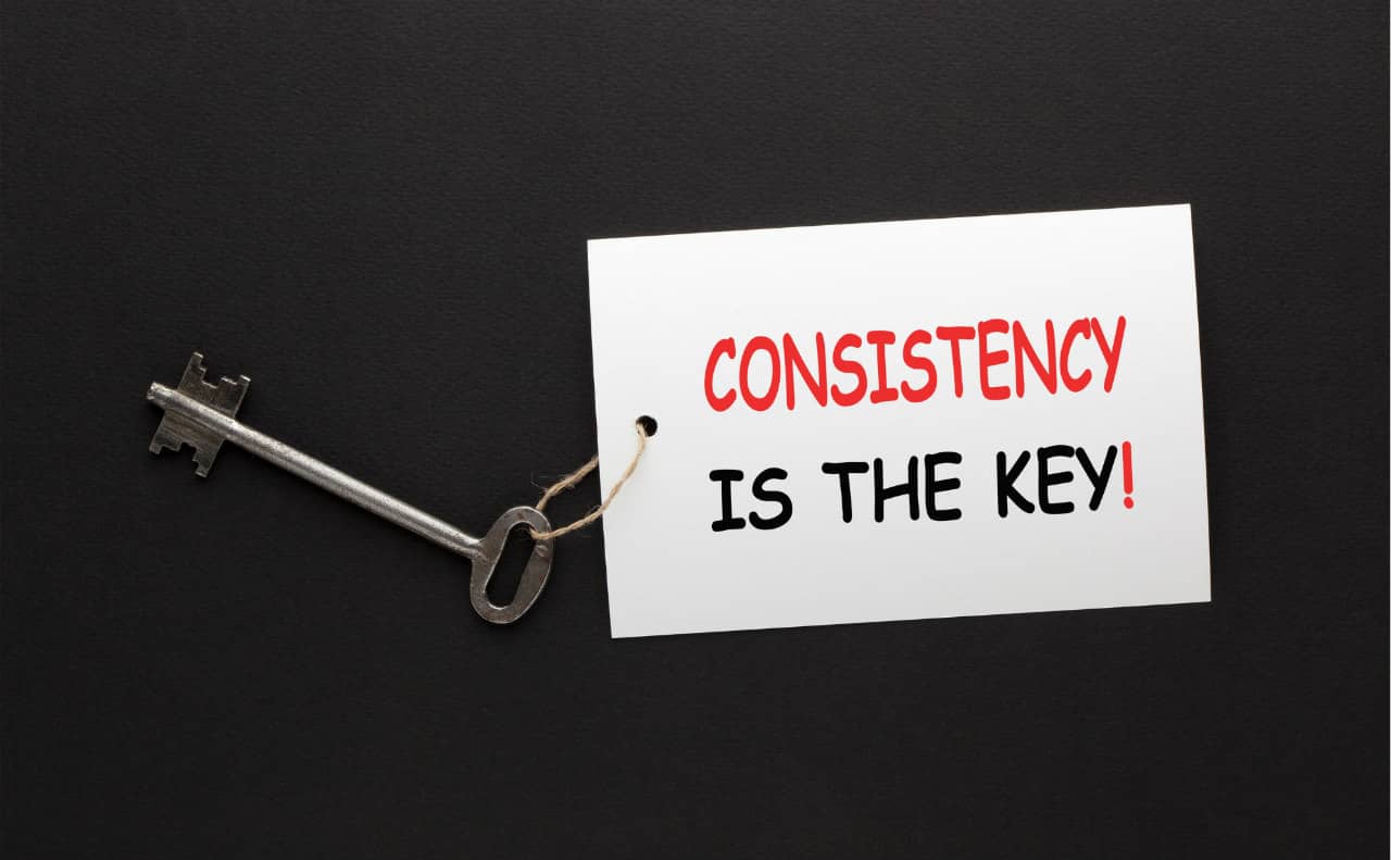 key with a tag that says consistency is the key